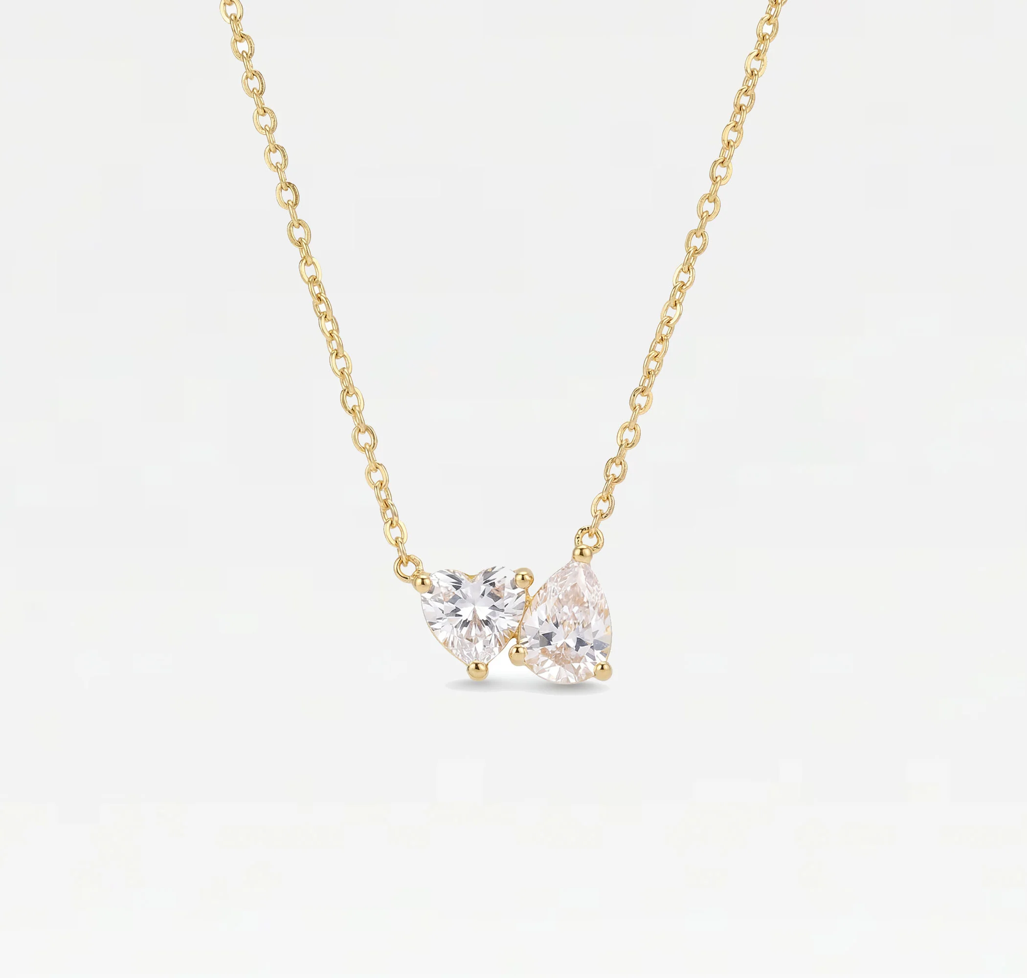 The Clear Heart Pear Necklace