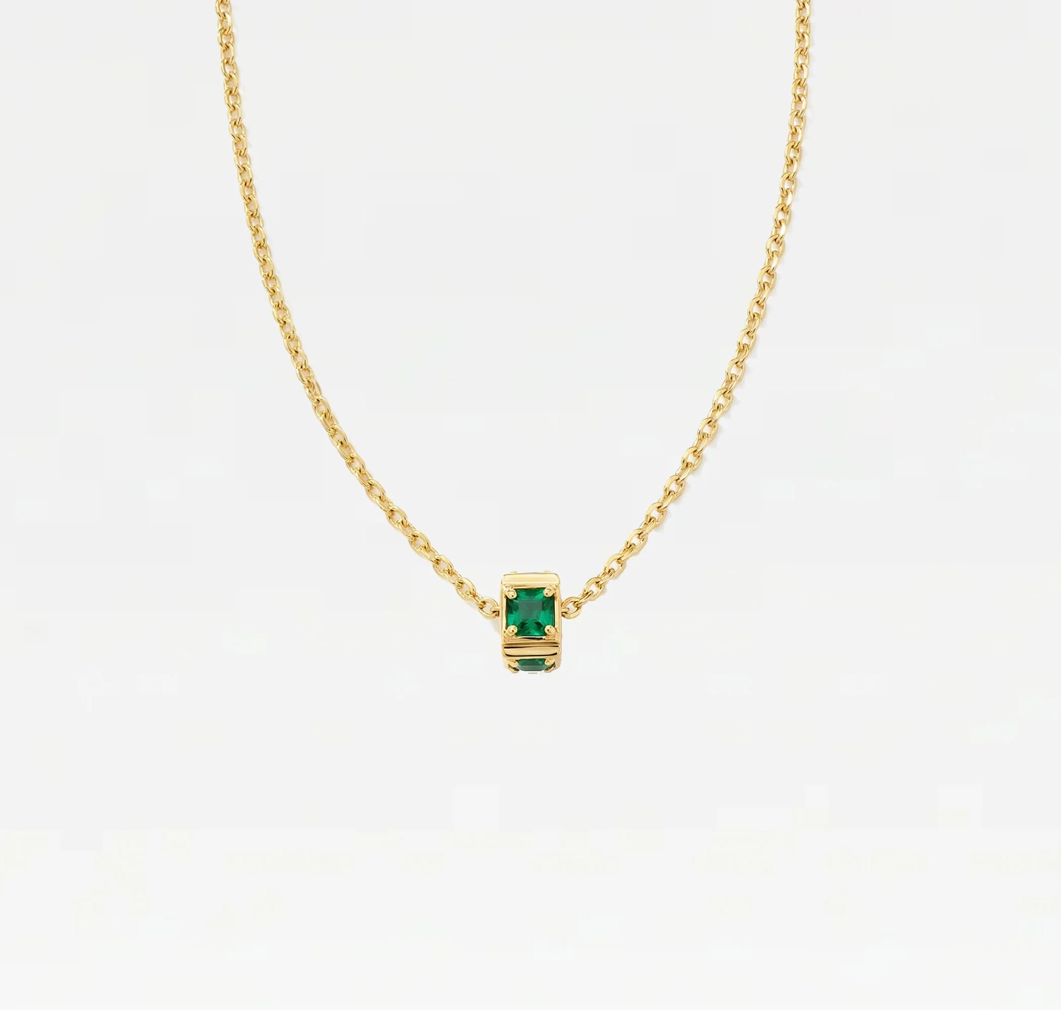 THE EMERALD WHEEL PENDANT
