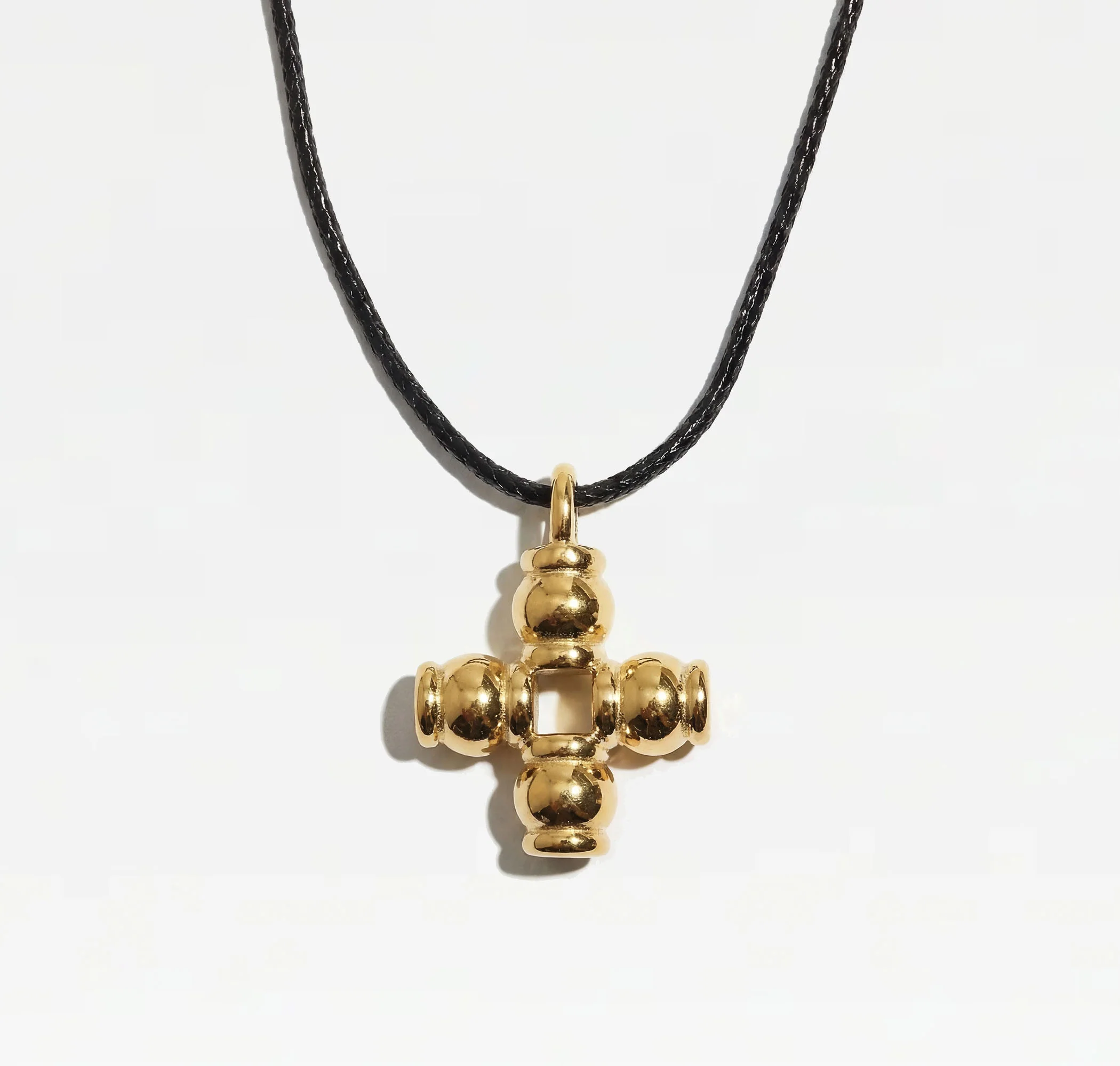 THE PALMA CROSS NECKLACE
